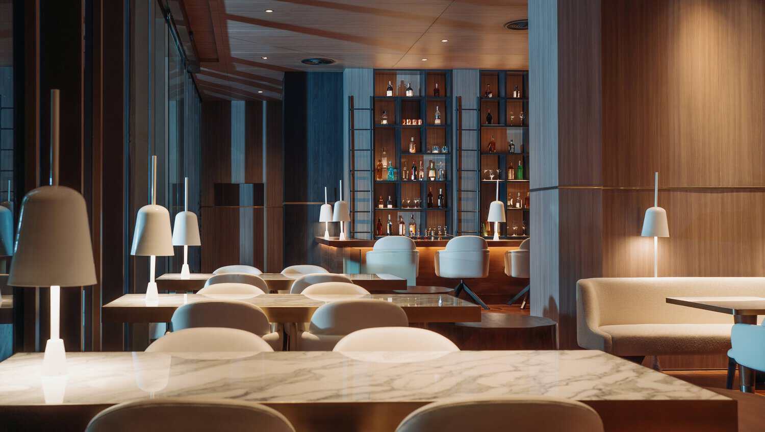 Garden-facing dining area inside Ms.Jigger at Kimpton Maa-Lai Bangkok.