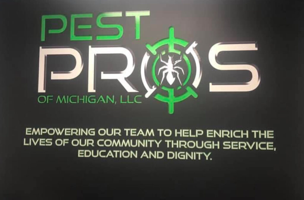 Close up of our conference display both, with the Pest Pros logo and the title: Empowering our team to help enrich the lives of our community through service, education, and dignity.