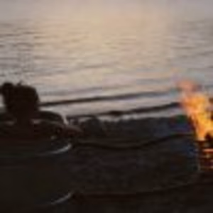 Ein Bad in einem holzbeheizten Whirlpool am Meer, der mit einem Edelstahl-Heizschlangensatz beheizt wird.