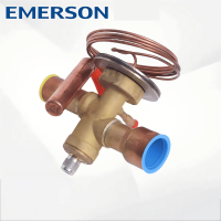 Emerson TX7 thermostatic expansion valve for R410A, side angle view showing brass body profile and dimensions