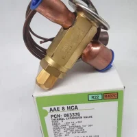 Close-up of EMERSON AAE2/3/4/5/8HCA R22 R407C expansion valve showing brass body and capillary tube detail