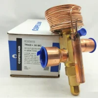Emerson TRAE 9 13 14 22 30 40 45 50MC R134A expansion valve unboxed with accessories laid out on surface