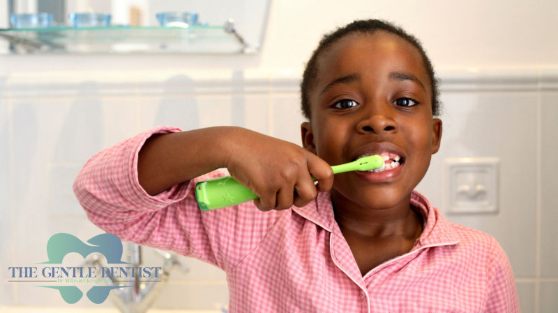 Baby Teeth Header Young child brushing teeth, promoting early dental care at The Gentle Dentist in Centurion.