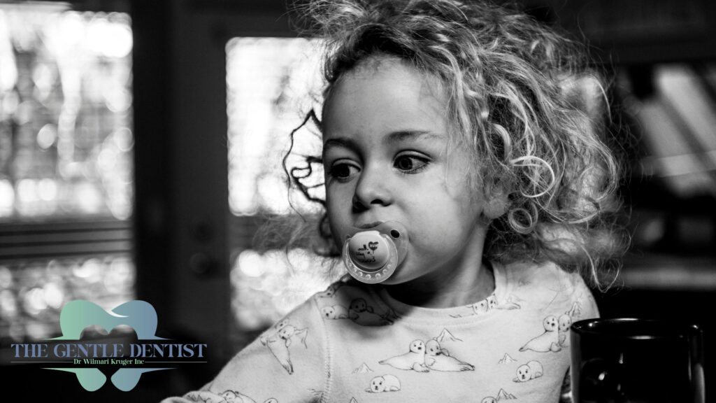 The Dummy Dilemma: How Long Is Too Long and What It Means for Your Baby’s Teeth 2 Toddler with dummy in mouth at home. Early dental care advice from The Gentle Dentist Centurion.
