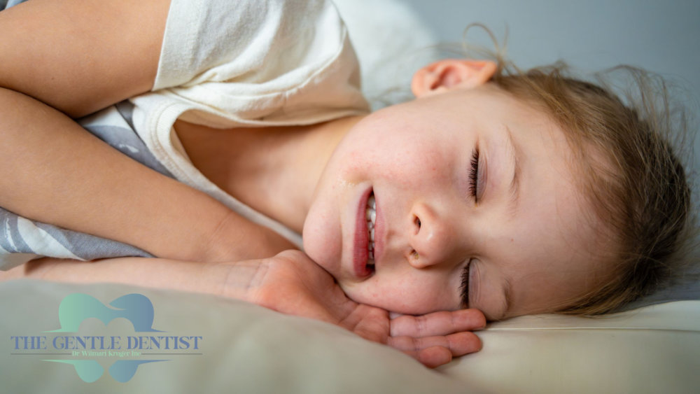 Teeth Whitening Header (3) Child clenching teeth while asleep. | Bruxism/Nighttime teeth grinding support from The Gentle Dentist Centurion.