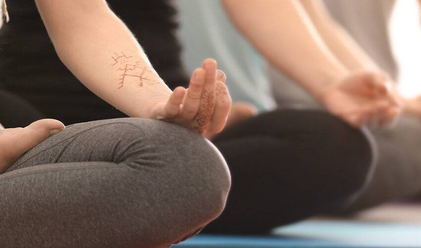 Discover benefits of yoga at a wellness retreat banner
