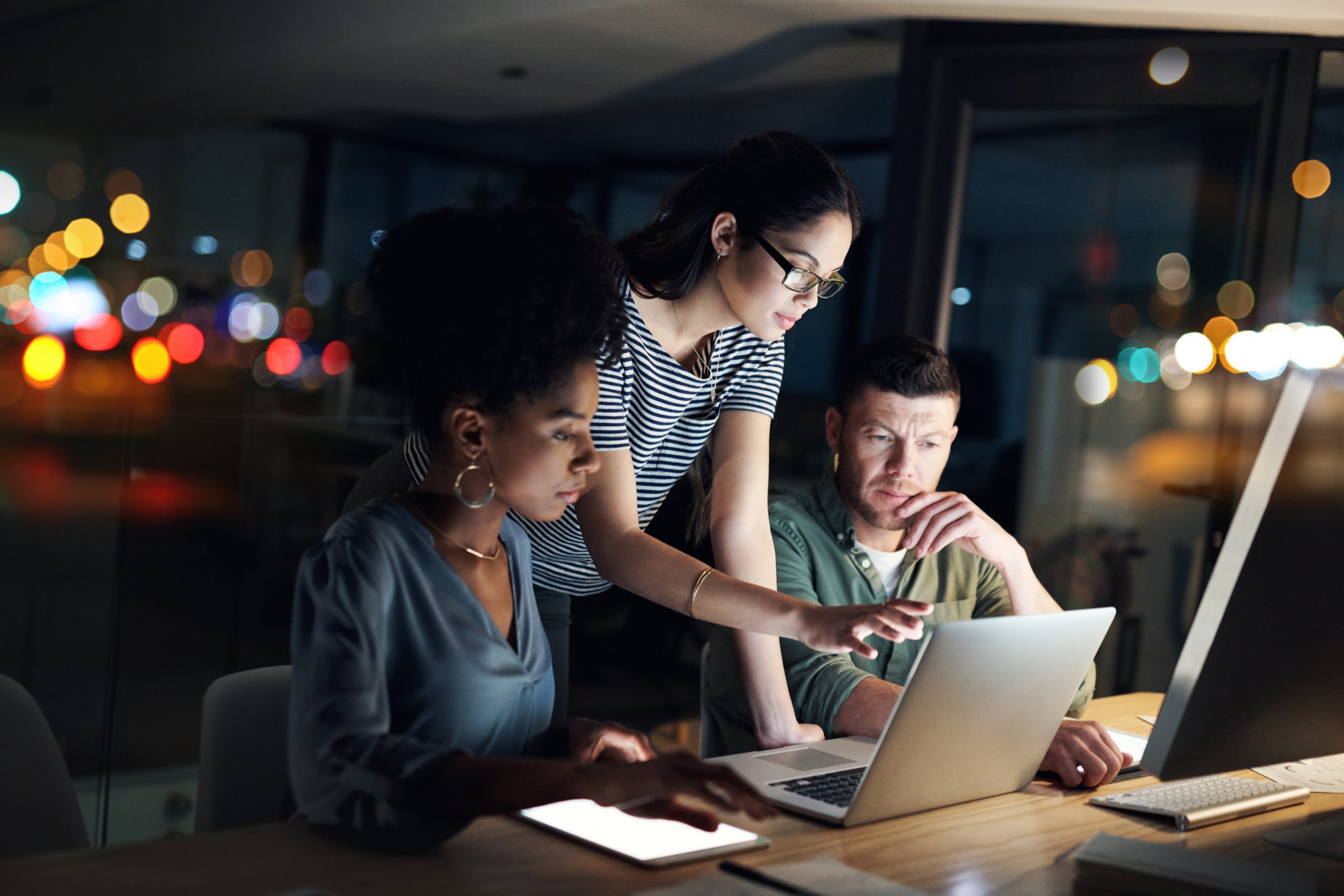 Effective Prospect Targeting for Increased Sales Team collaborating on digital marketing strategies to target prospects and boost sales conversions.