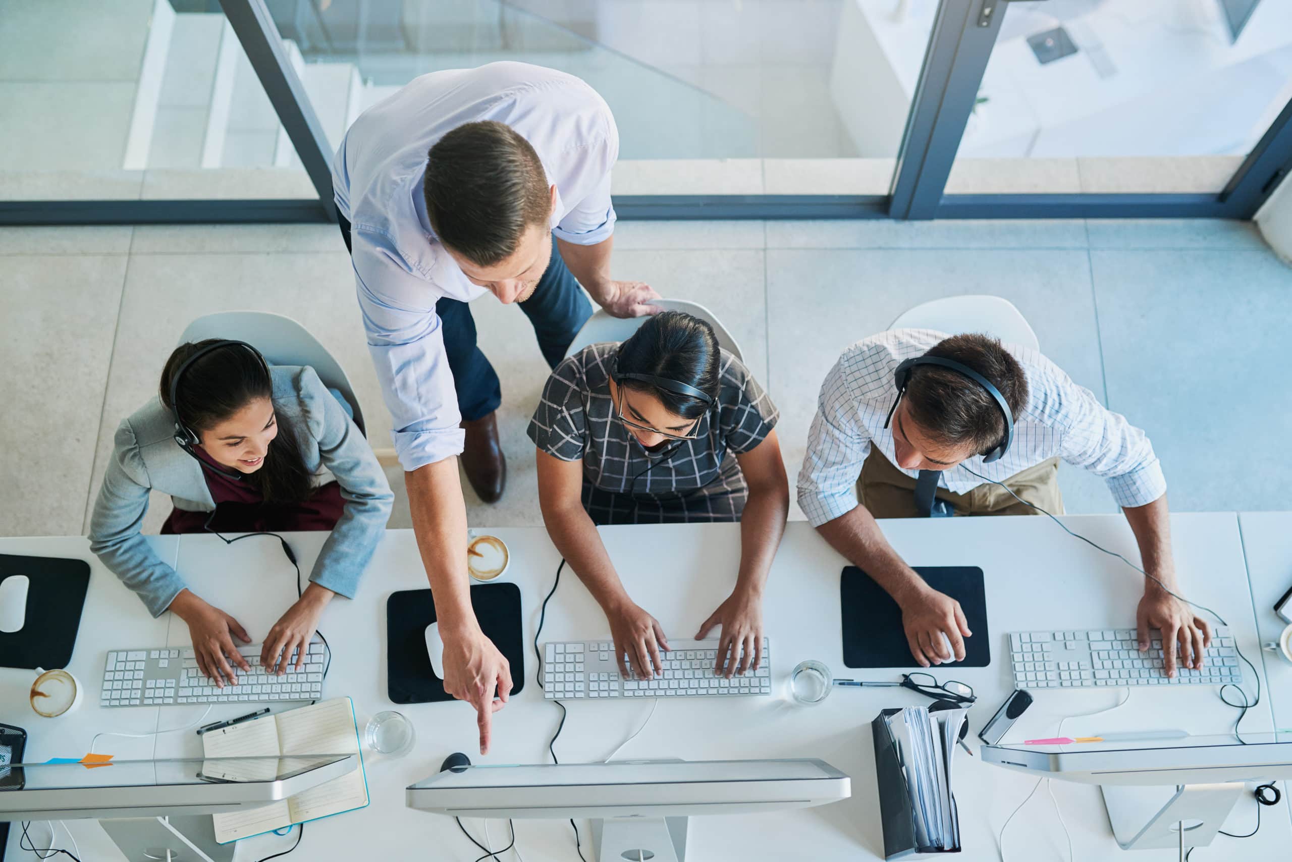 Innovative B2B Inside Sales Strategies B2B inside sales professionals collaborating in a modern office environment.