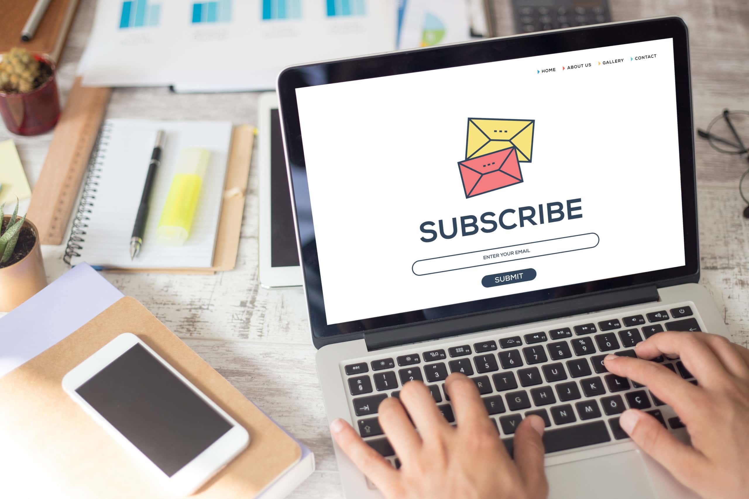 Subscribe to Our Newsletter for More Tips Person subscribing to a newsletter on a laptop with "Subscribe" screen.