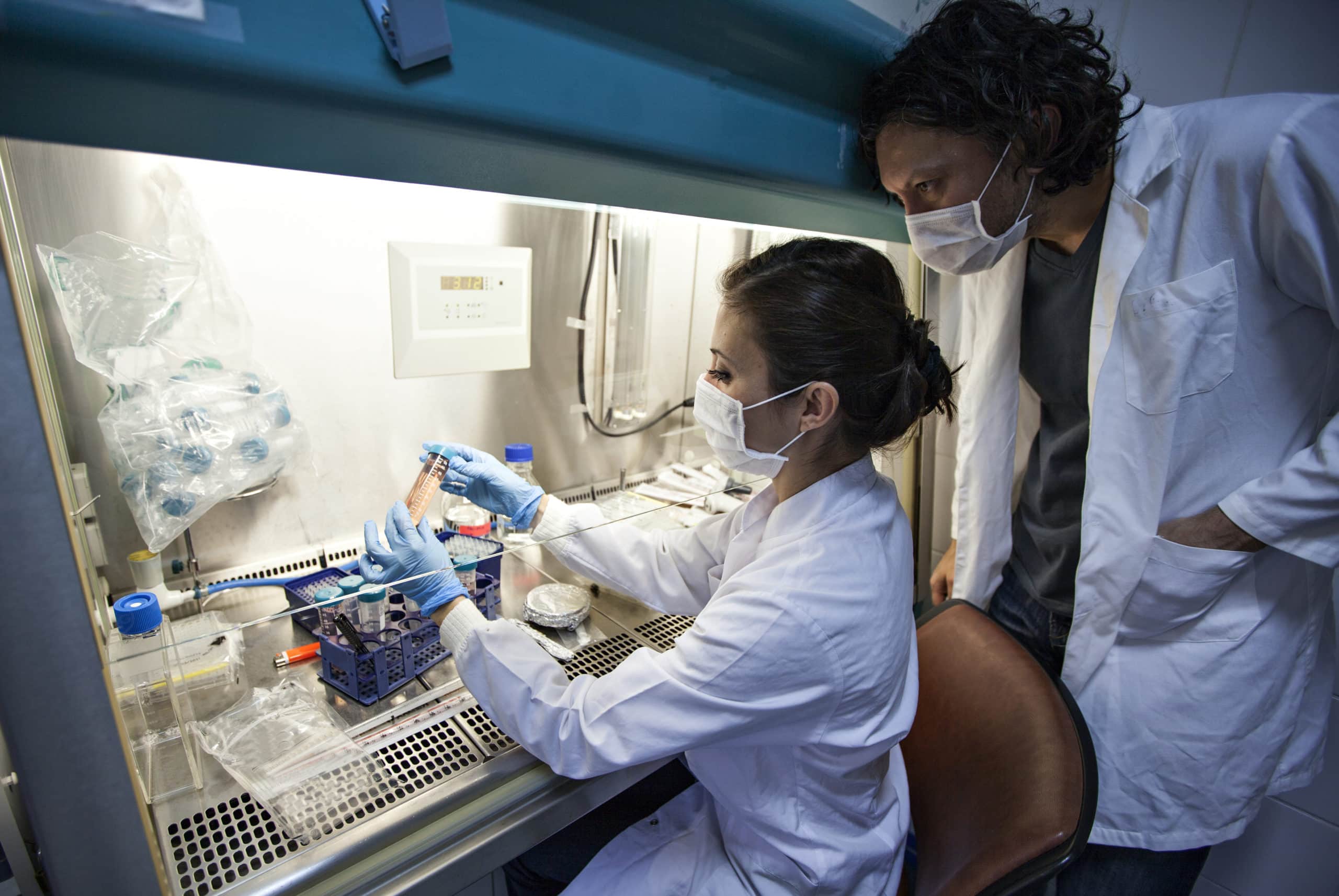 Innovative Healthcare Sales Lab Healthcare professionals working in a laboratory setting with testing equipment.
