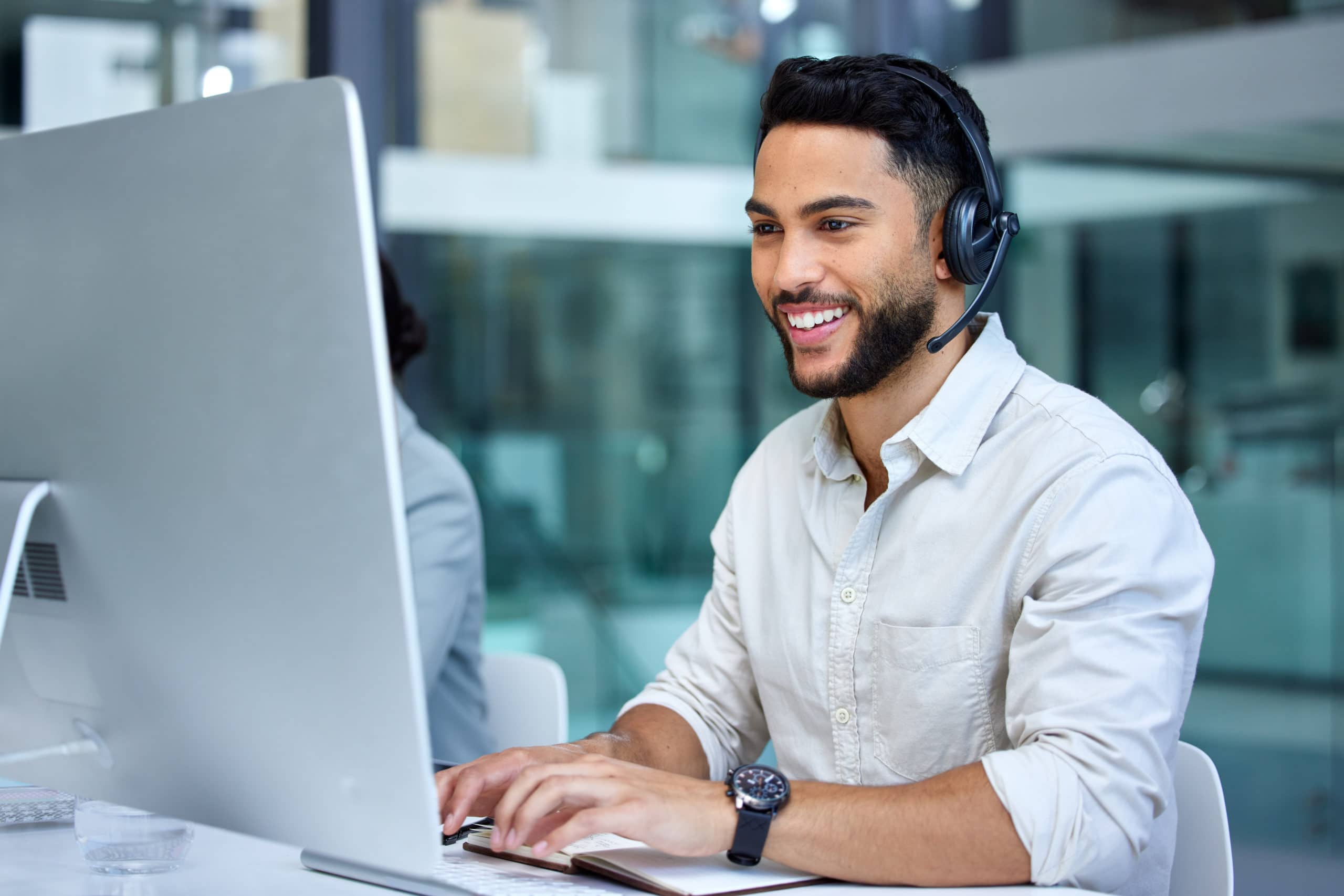 Sales prospecting tips to generate more leads Effective sales prospecting with a friendly professional on a call.