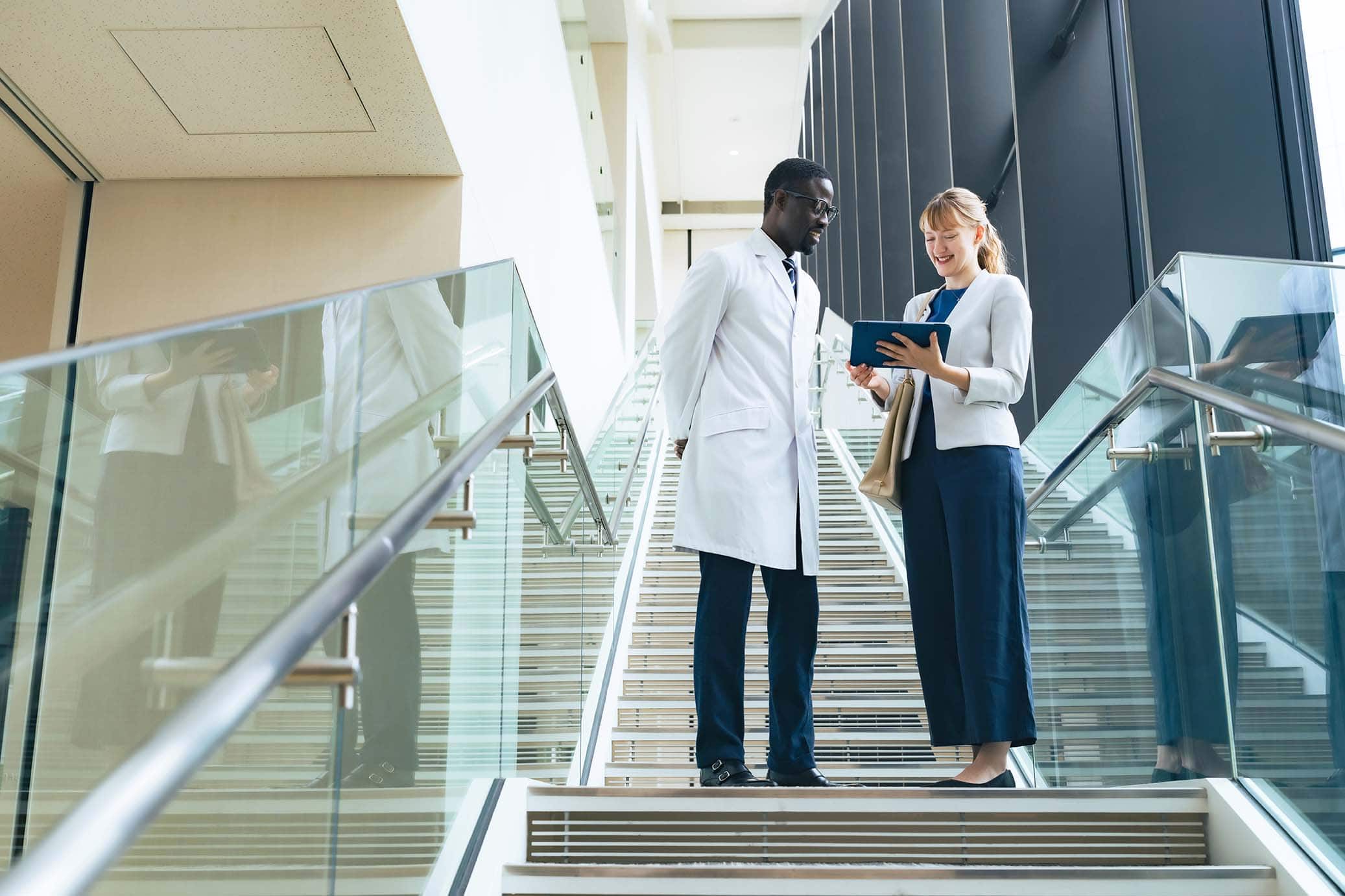 Innovative Medical Sales Strategies Medical device sales rep meeting with doctor