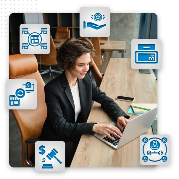 Custom-eCommerce-Web-Apps-Expansion-Modules-feat-img A woman in business attire types on a laptop at a modern office desk, surrounded by digital finance icons, reflecting the dynamic world of best ecommerce sites, including online payment, savings, a credit card, a store, money transfer, and auction symbols.