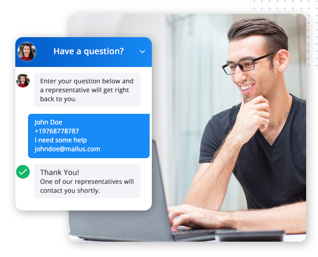 Automator-website-chat-img A man with glasses smiles at his laptop. On the screen, a chat window—powered by the best CRM platform—displays a customer service exchange, including a user’s contact details and confirmation that a representative will respond soon.