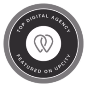 Upcity-Top-Digital-Marketing-Agency Circular badge with a dark center and gray border, perfect for showcasing in an Award Slider. Features the text "Top Digital Agency Featured on UpCity" around a central abstract logo of two interlocking shapes, with a tooltip for added detail.
