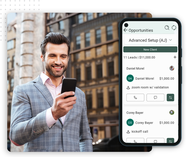 xtreme-automator-mobile-app-img-crisp A smiling man in a gray checked suit uses his smartphone outdoors, while a large phone screen overlay displays a CRM platform featuring opportunities, client names, and scheduled calls.